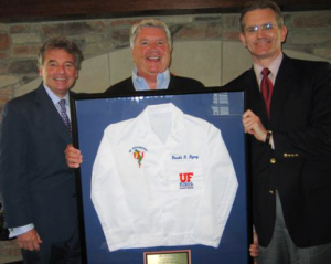 Drs Mark Gold and Bruce Kone present White Coat to Don Dizney